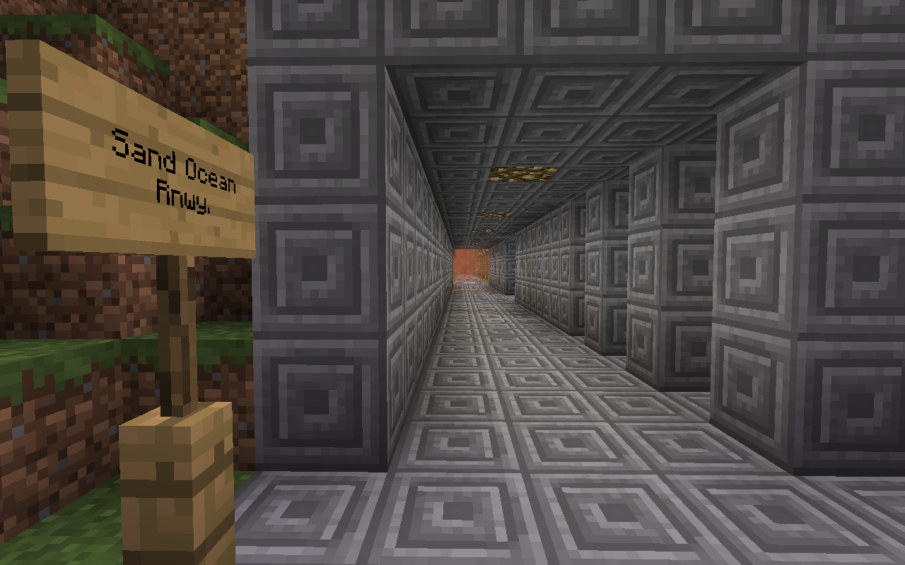 Gepflasterter Steintunnel mit Wegweiser „Sand Ocean Rnwy.“