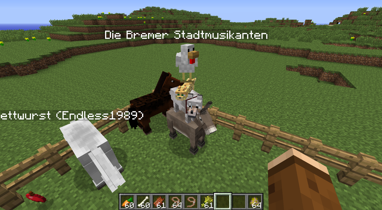 Die Bremer Stadtmusikanten: Huhn, Katze und Wolf auf einem Esel